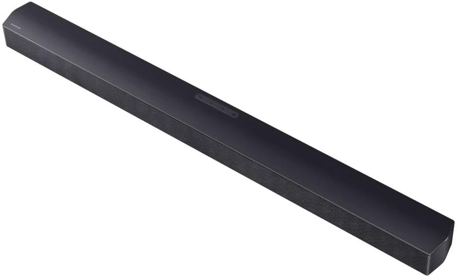 Ajuda a destacar dimensões, acabamento e como a soundbar se encaixa abaixo da TV.